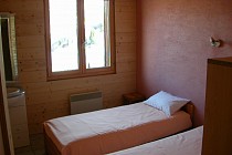 Chalet Andreas en Jacobin slaapkamer met 2 1-persoonsbedden en kast